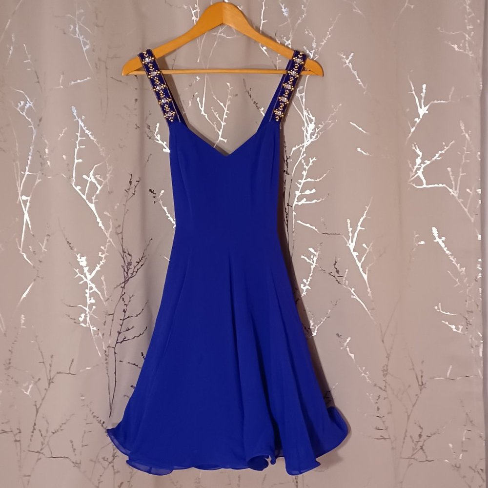 Niteline  By Della Roufogay Dress 100% silk  6 Deep Purple cross strap fun dress
